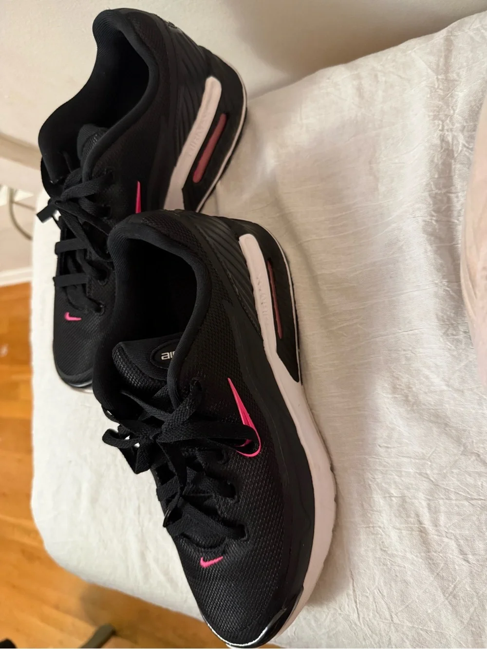 Nike Women's Black Athletic Shoes with Pink Swoosh